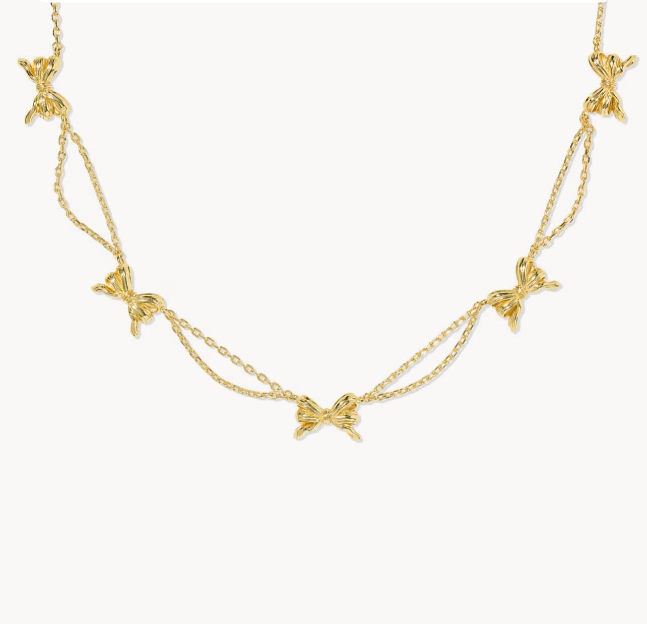 KENDRA SCOTT: BOW STRAND NECKLACE