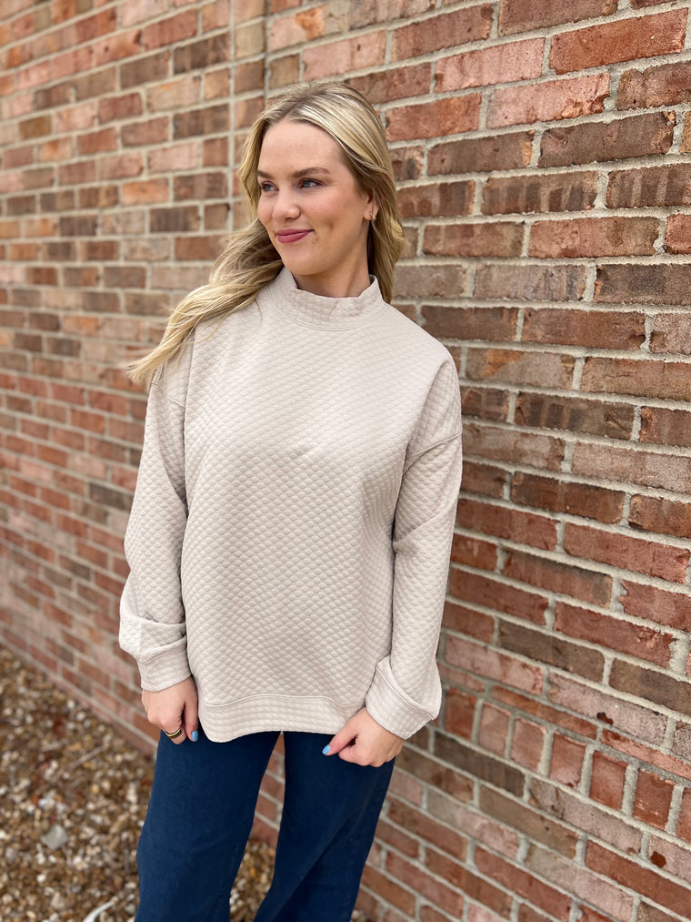 SEEING SPOTS MOCK NECK TOP