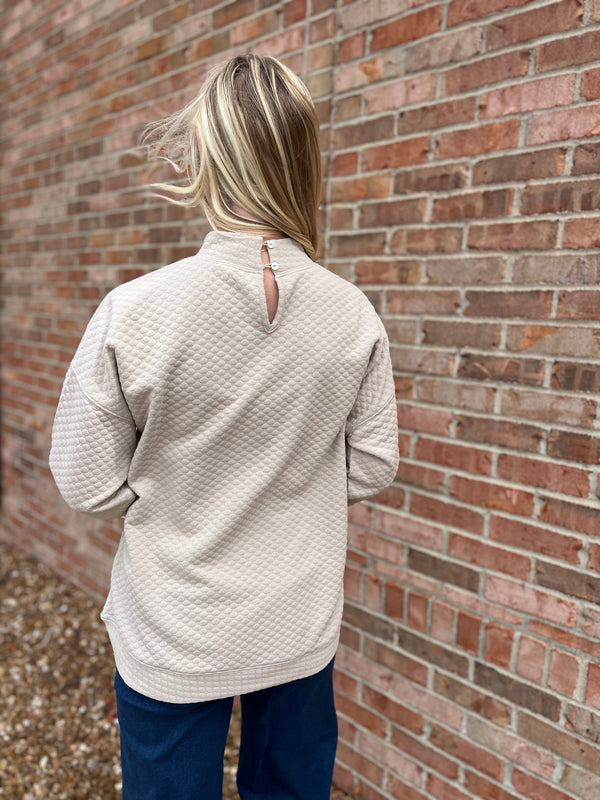 SEEING SPOTS MOCK NECK TOP