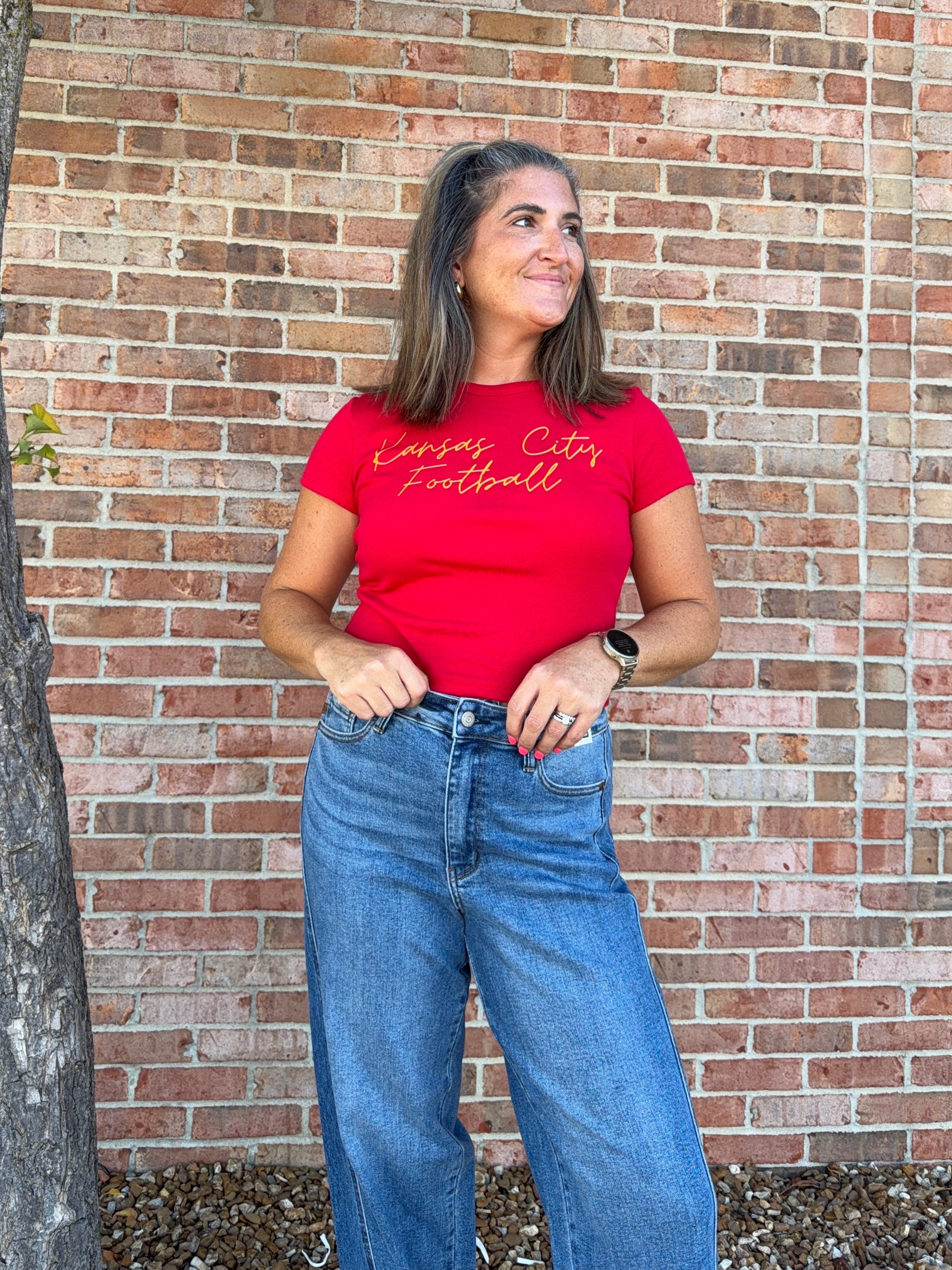 KANSAS CITY FOOTBALL BABY TEE