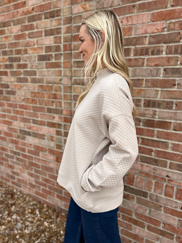 SEEING SPOTS MOCK NECK TOP