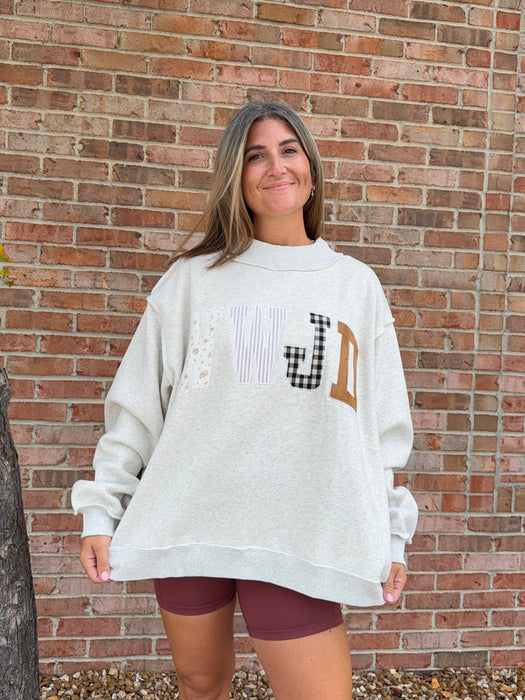 WWJD EMBROIDERED MOCK NECK SWEATSHIRT