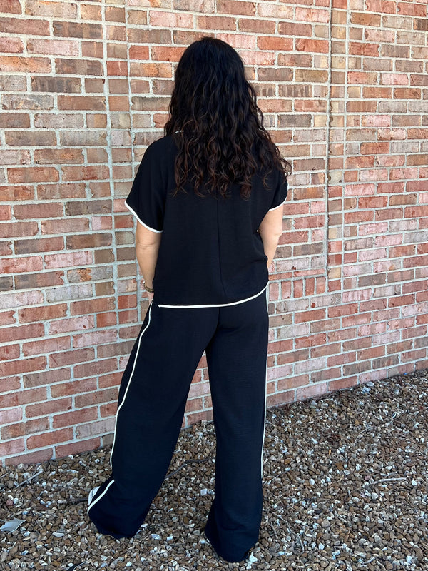 BLACK PANTS WITH WHITE TRIM