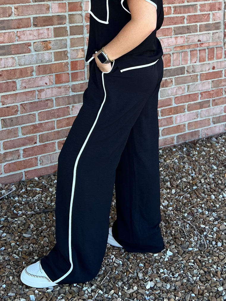BLACK PANTS WITH WHITE TRIM