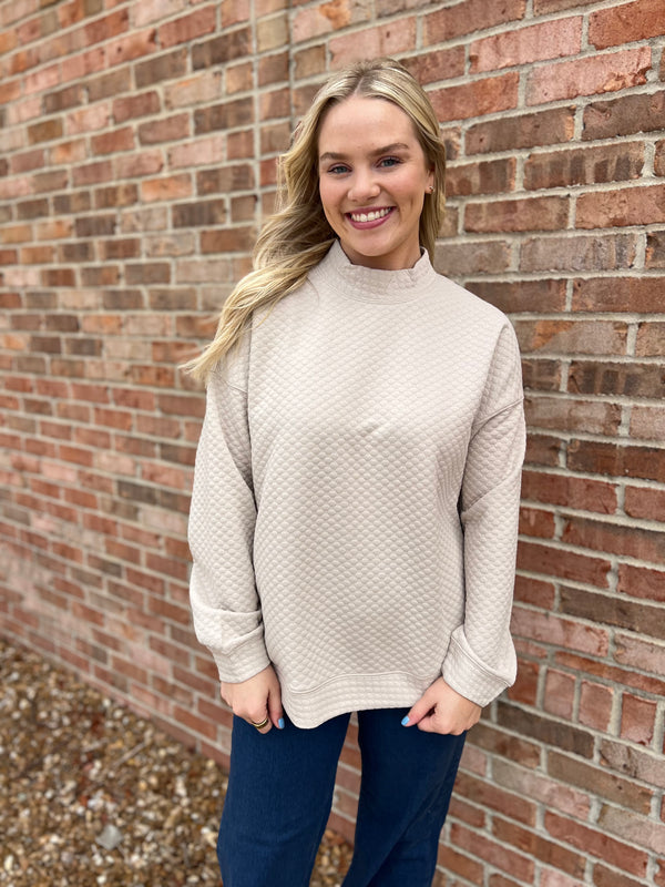 SEEING SPOTS MOCK NECK TOP