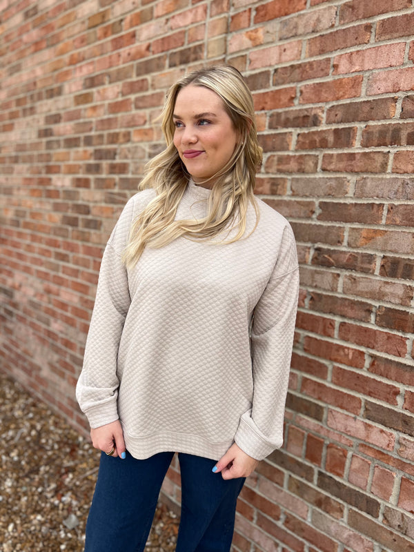 SEEING SPOTS MOCK NECK TOP