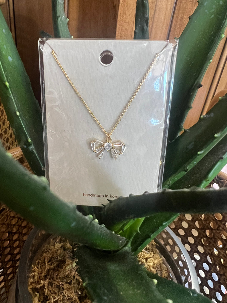 CRYSTAL BOW NECKLACE