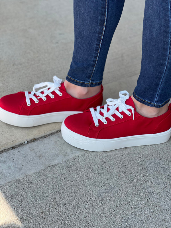 Red sneakers 2025 with white sole