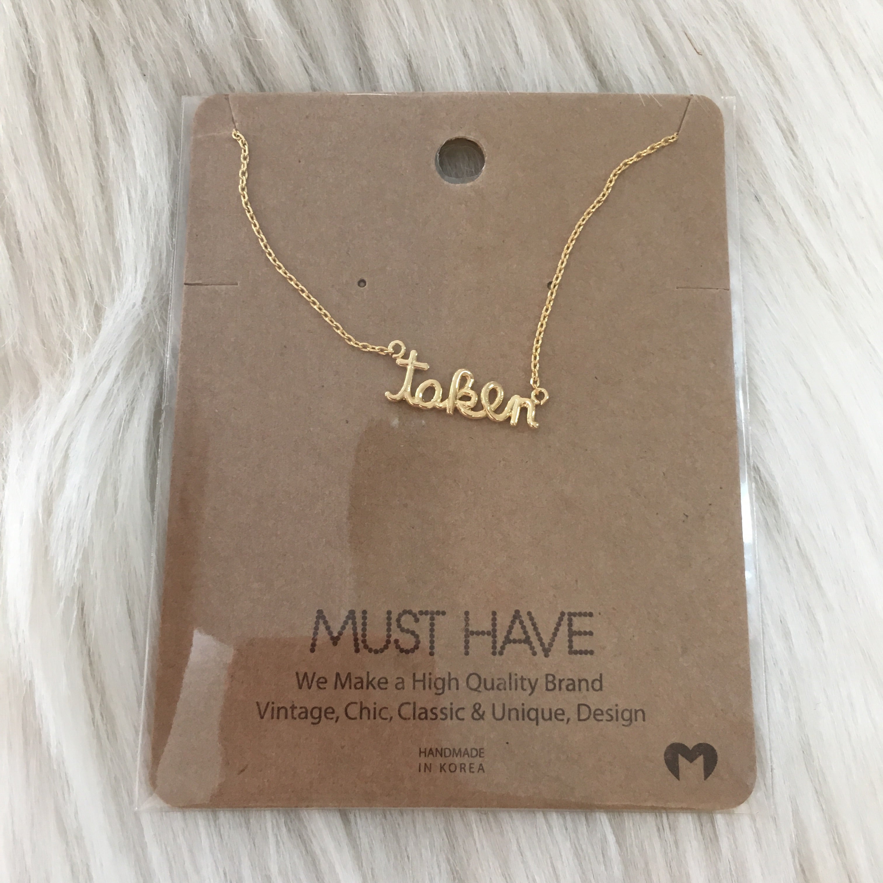 MUST HAVE: TAKEN NECKLACE